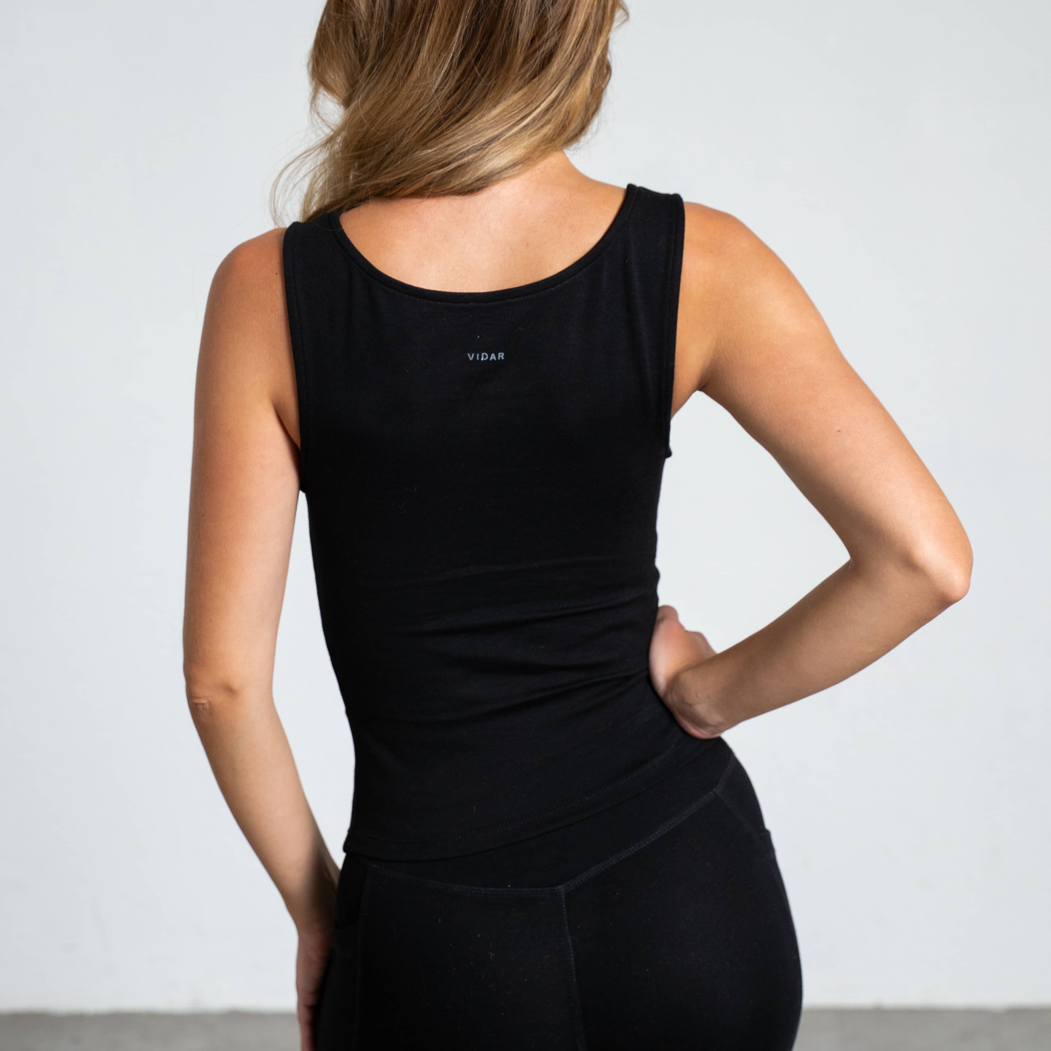 PULSE | Natural Sport Top – schwarz